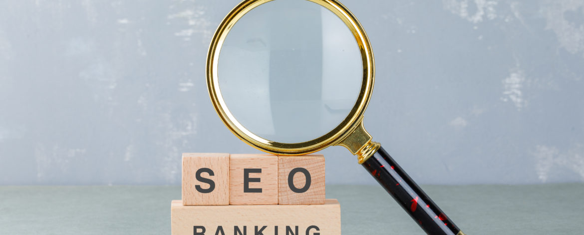 Conceptual of seo analysis and business. with wooden blocks with words on it, magnifying glass on sage color background side view. horizontal image